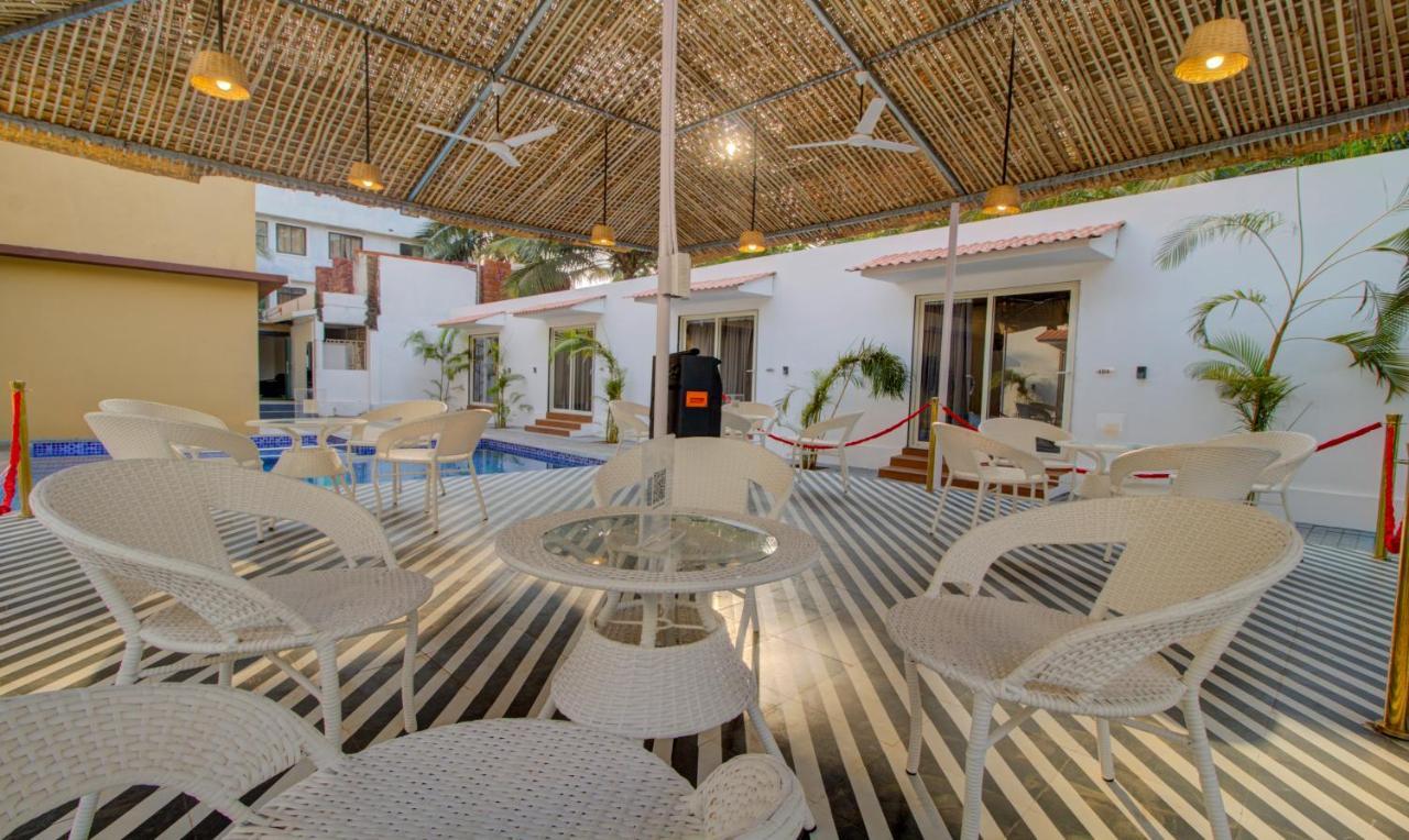 Treebo Code Red Hotel Морджим Екстериор снимка
