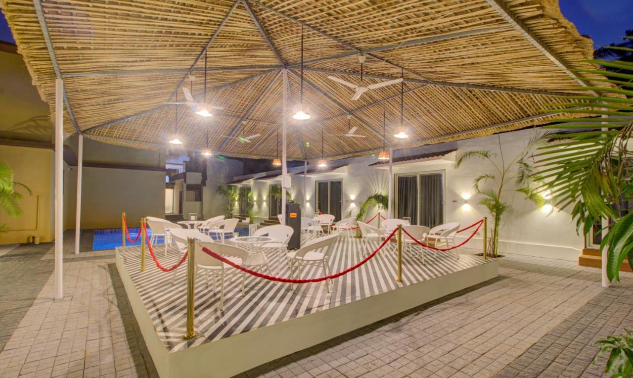 Treebo Code Red Hotel Морджим Екстериор снимка